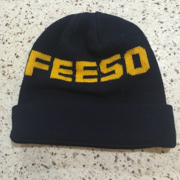 FREE GIFT WITH PURCHASE. Navy blue hat with yellow block lettering - Picture 2 of 2